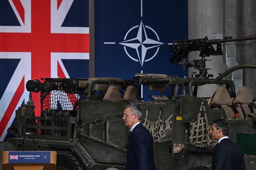 NATO Secretary General Jens Stoltenberg (L) and Britain's Prime Minister Rishi Sunak.jpg