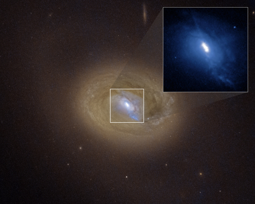 Black_hole_pair_embedded_in_middle_of_active_galaxy_MCG-03-34-064_pillars.jpg